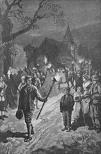 Men at a parade with Easter torches
