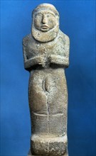 Statuette of a naked bearded man