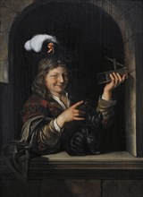 A young boy with a cat and a mousetrap, ca.1675-1679, by Eglon van der Neer