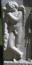 Relief depicting Cupid with torch.