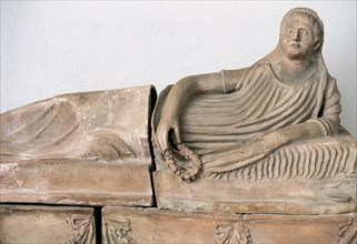 Etruscan sarcophagus depicting a female reclining deceased.