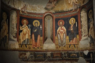 Fresco depicting Saint Peter and the Virgin with chalice and Saint John the Baptist and Saint Paul.