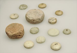 Set of marble and brick of a Roman game.
