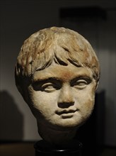 Bust of a boy about three years old.