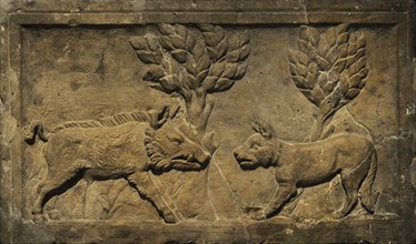 Relief depicting a dog and a wild boar facing each other.