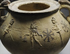 Pottery depicting Mithras surrounded by the torch-bearers Cautes and Cautopates.