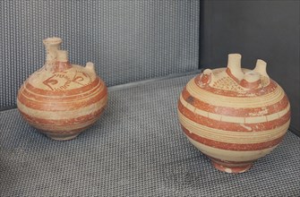 Mycenaean vessels. Small stirrup jars.