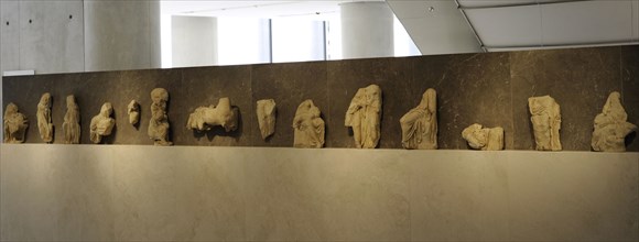 Scenes from myths associated with cults of Erechteion.