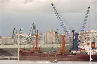 Commercial port. Cranes.
