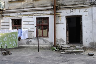 Inner courtyard of a house with laundry clothes drying.