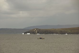 View of the Atlantic coast. Fishing boat.