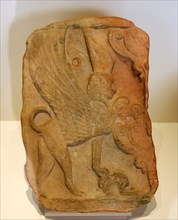 Pinax decorated with sphinx