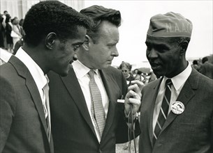 Actor Sammy Davis, Jr and Roy Wilkins being interviewed