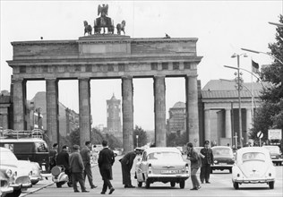 In front of the Brandenberg Gate which marks the border between East and West Berlin, West Berlin police warn motorists about the danger of entering East Berlin. The East Germans have barred West Germ...