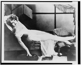 Circa 1920 - Clara Bow - The 'It' girl - reclining on a chaise