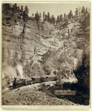 Train going through Elk Canyon