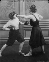 Photo shows Fraulein Kussin (right) and Mrs. Edwards (left) who had a boxing match on March 7, 1912.