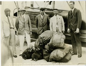 No date - Pan American Air Mail Service inaugurated - Charles A. Lindbergh (far right) greeted by Mayor and Postmaster of Miami on return from Belize.