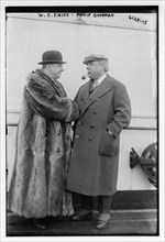 No date - W.C. Fields, wearing a fur coat, and Philip Goodman on board a ship