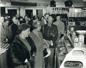 First Lady Mamie Eisenhower and Queen Mother Elizabeth examine the nut counter at a Washington, DC Walgreen's Drug Store. November 6, 1954. Photo: Abbie Rowe