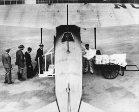 Passengers & Mail Loaded Into Fokker