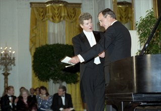 President Bush Introduces Concert Pianist Van Cliburn to Attendees at the State Dinner for Hungarian Prime Minister and Mrs. Jozsef Antall 10 18 1990.