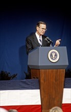 President George H.W. Bush speaks at the Pentagon during the swearing in ceremony for Richard B. Cheney, newly appointed secretary of defense 3 21 1989.