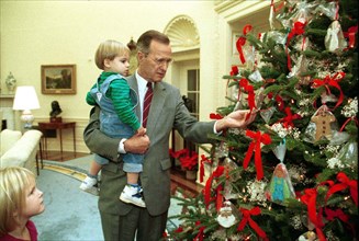 President Bush Shows his Grandson, Walker, the Oval Office Christmas Tree 12 9 1991.