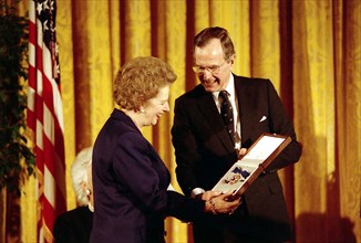 President Bush Presents the Presidential Medal of Freedom to Former British Prime Minister Margaret Thatcher 3 7 1991.
