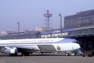 Air Force One, the VC-137C Stratoliner aircraft used to transport the president, sits in a roped-off area near the terminal building at Tempelhof Central Airport during President Reagan's visit to Ber...