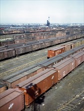 General view of part of the Proviso yard of the Chicago and Northwestern [i.e. North Western] railroad, Chicago, Ill. In the background is the coal chute and roundhouse April 1943.
