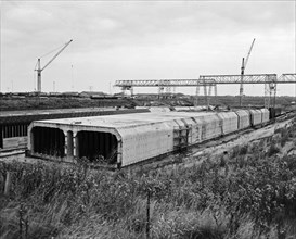 Construction of the IJtunnel or Construction of the Coen Tunnel / date October 1, 1963.