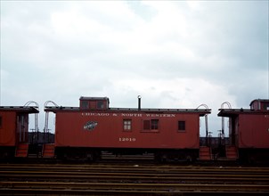 Caboose on the caboose track at C & NW RR's [i.e. Chicago and North Western railroad's] Proviso yard, Chicago, Ill. April 1943.