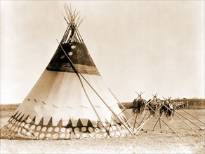 Edward S. Curits Native American Indians - Tepee on the plains of Alberta, Canada circa 1927 .