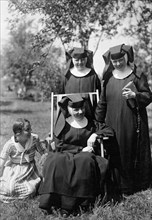 Three nuns outdoors - Mendingen Institute Location: Mendingen, Germany circa 1930s or early 1940s.