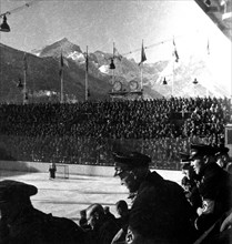 Nazi soldiers attending a hockey game in Germany circa 1930s or early 1940s.