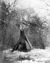 Edward S. Curtis Native American Indians - A Sioux Indian teepee in a winter camp circa 1908.
