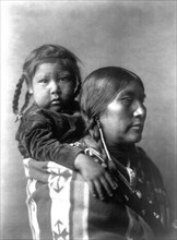 Edward S. Curtis Native American Indians - Apsaroke mother circa 1908.
