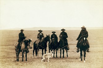 Roping gray wolf,' Cowboys take in a gray wolf on 'Round up,' in Wyoming 1887.