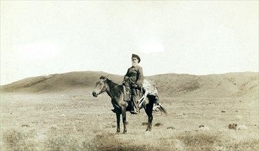 Dick Latham of Iron Mountain, Wyo., returning home from the plains with the antelope he has slain 1888.