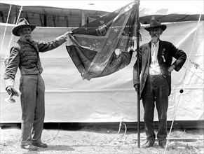 Confederate Reunion: Battle flags of war between the states circa 1917.