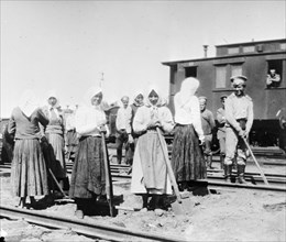 War in Russia - Russian Women in 1917 near train .