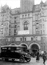 Post office department building, 12th and Pennsylvania Avenue, with Liberty Loan Banner, Washington D.C. - circa 1917.