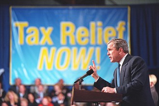 President George W. Bush delivers remarks on tax relief March 9, 2001 at Lafayette Regional Airport in Lafayette, LA.  .