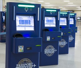 Global Entry and APC Kiosks, located at international airports across the nation, streamline the passenger's entry into the United States.  2014 .