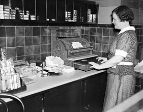 Female cashier at U.S. Capitol restaurant circa 1937.