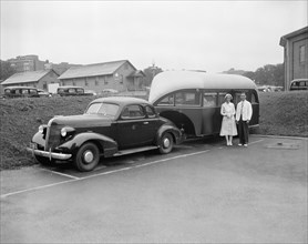U.S. Public Health Service uses trailer clinic in war against syphilis circa 1937 .