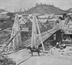 California History - Suspension Bridge over Deer Creek, Nevada City, Nevada County circa 1866.