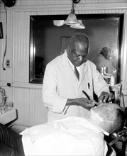 Senatorial shave. Washington, D.C., Jan. 6. Senator Fred H. Brown, new Democratic Senator from New Hampshire, gets a last minute shave circa 1937.