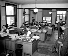 Secretaries in a Secretarial stenographic pool circa 1937.